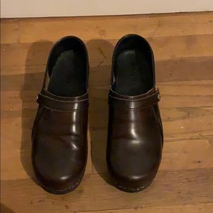 Brown leather clogs